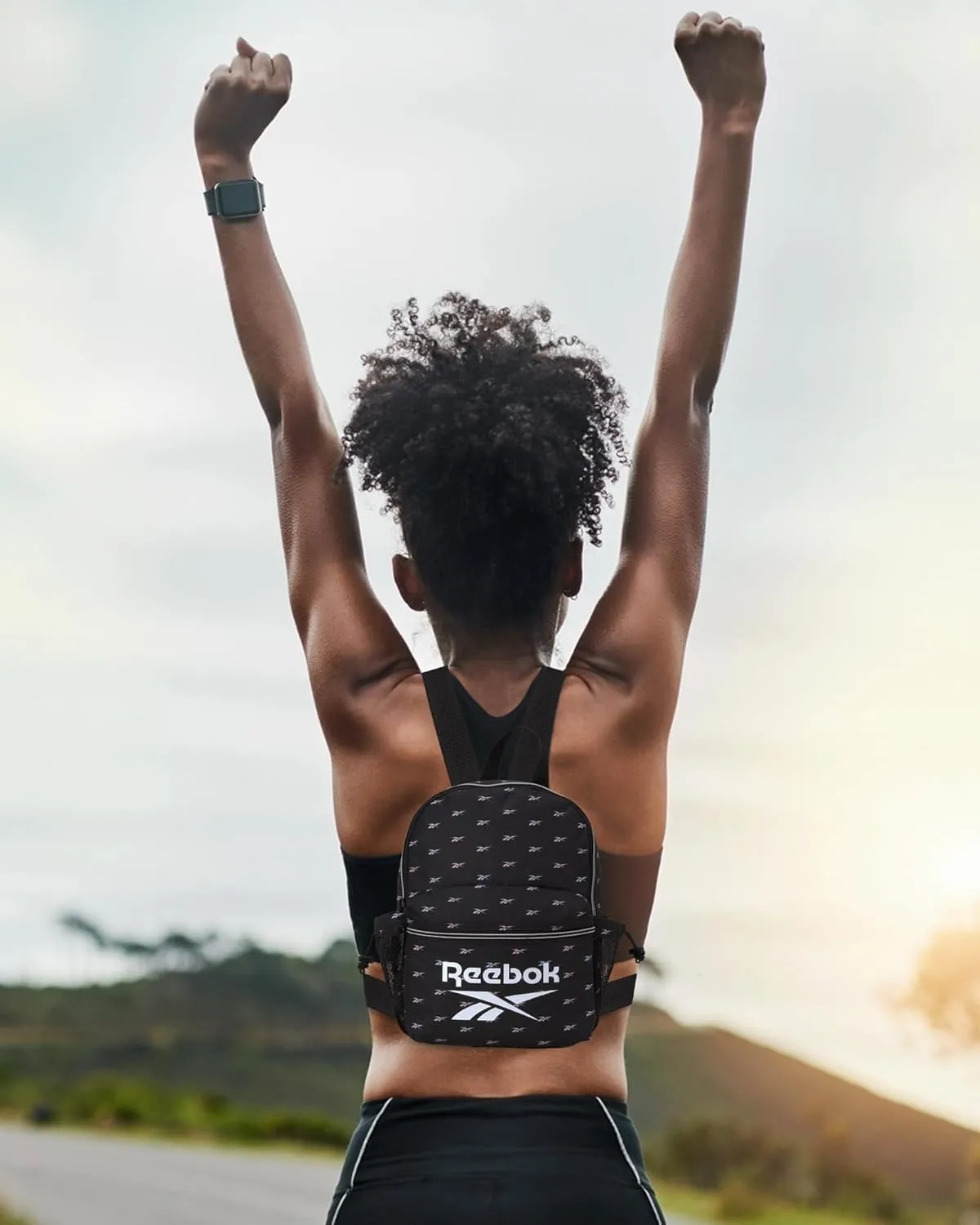 Reebok Women's Backpack - Lightweight Mini Essential Backpack - Small Casual Travel Bag for Women, Black Print Serena